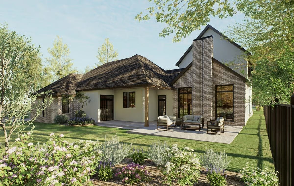 Brick, Stucco, and a Backyard That Actually Invites You to Sit Down