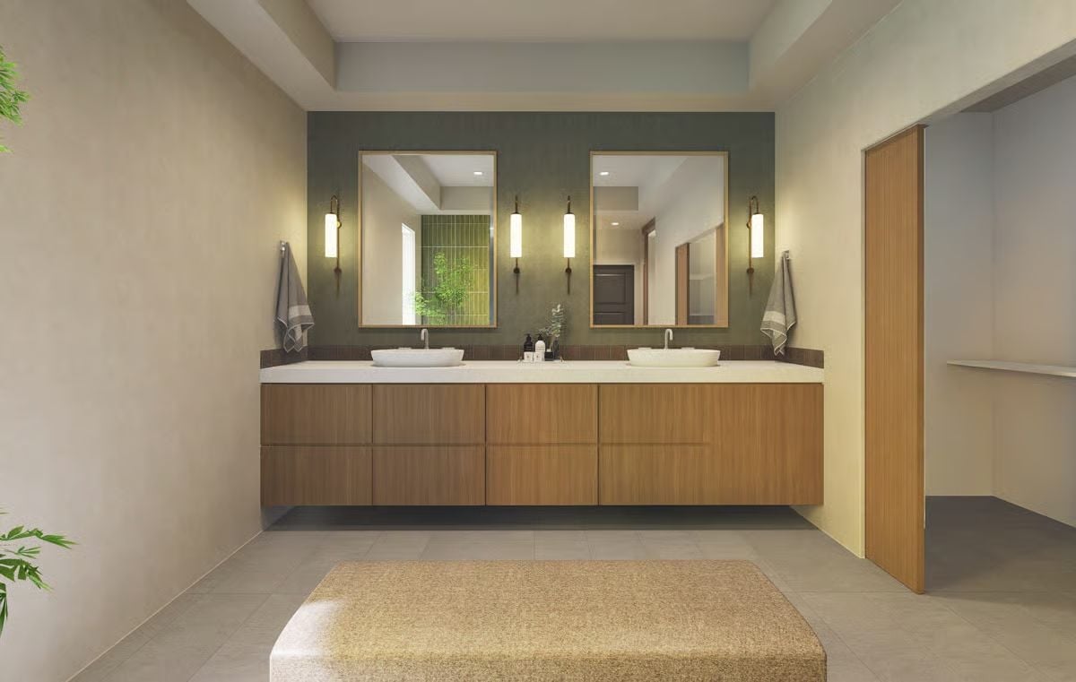Floating Walnut Vanity, Vessel Sinks, and a Green Accent Wall That Anchors the Room