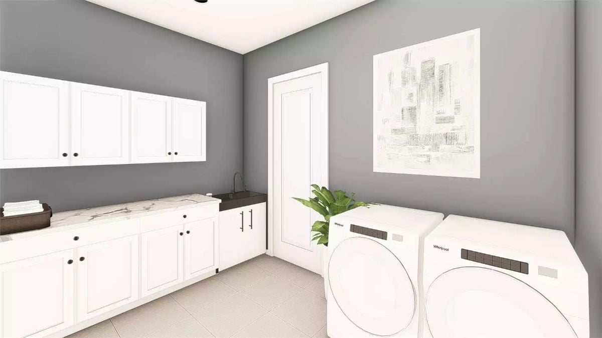 Marble Countertops and Upper Cabinets Turn This Laundry Room Into Actual Storage