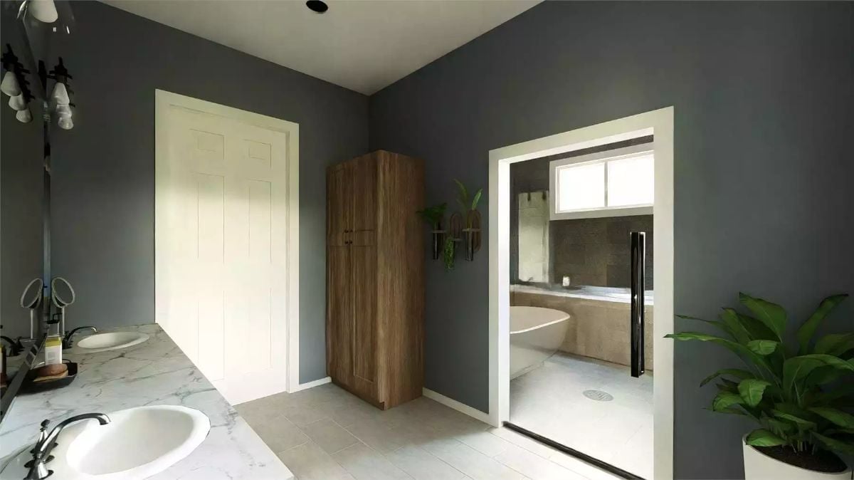 Marble Vanity, Wood Tower Cabinet, and a Wet Room Glimpsed Through the Doorway