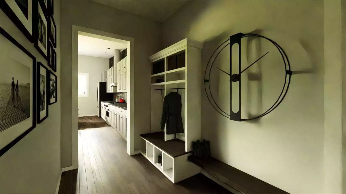 Oversized Iron Clock and a Built-In Mudroom Bench Make the Entry Work Hard