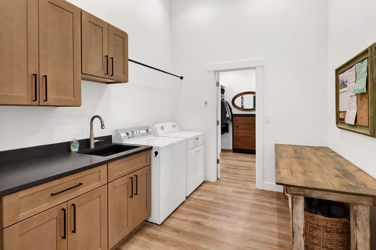 Black Sink, Hanging Rod, and a Door That Opens Straight Into the Closet