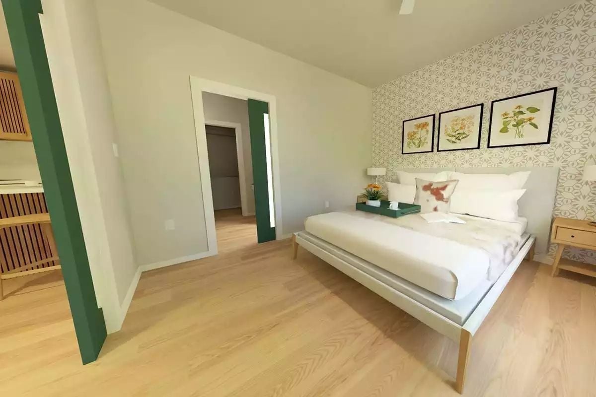 Botanical Prints Over the Bed Earn Their Place on a Patterned Wall