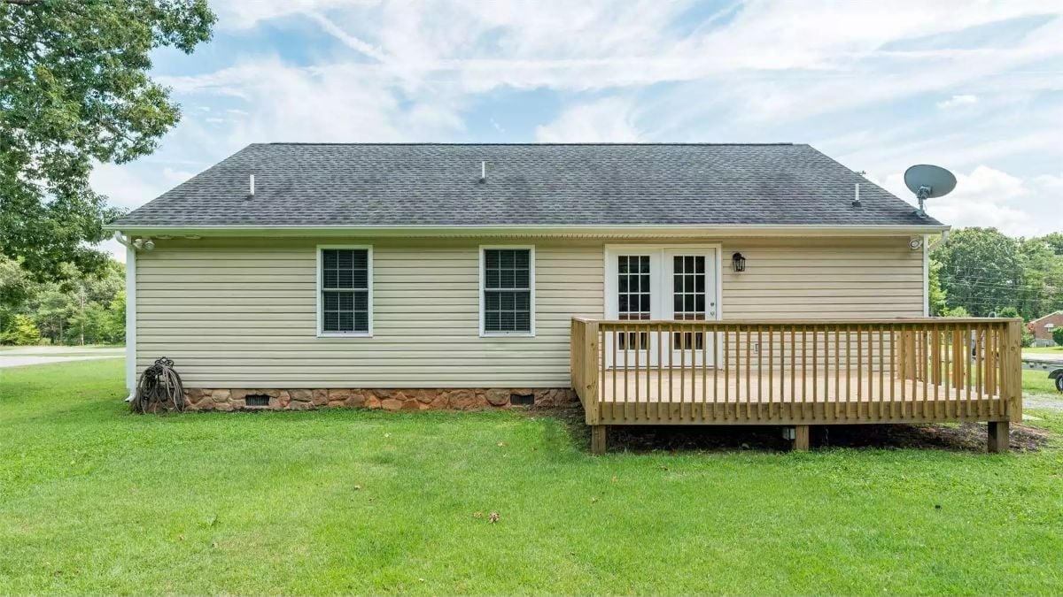 Fresh Deck, Stone Skirt, and a Back Door Worth Walking Through