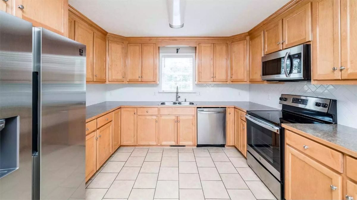 Stainless Appliances, Warm Maple Cabinets, and Enough Counter Run to Actually Cook