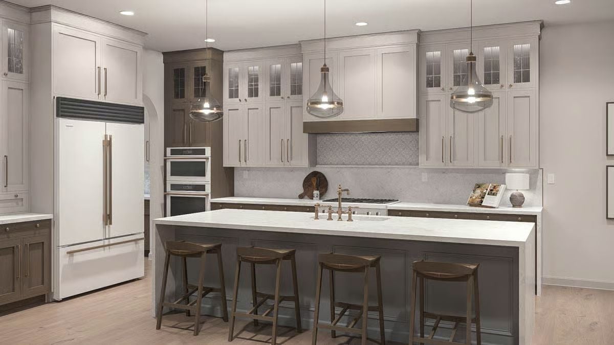 Brass Bridge Faucet Centered on an Island That Seats Five Comfortably