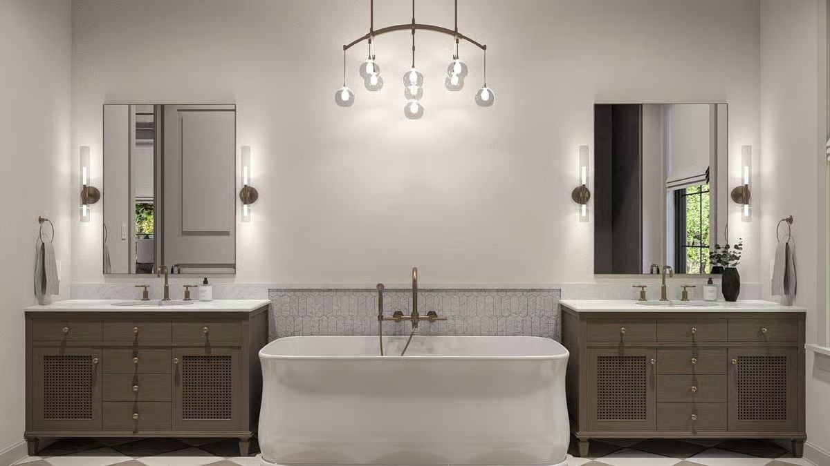 Dual Vanities Flanking a Freestanding Tub Make Symmetry Do Real Work
