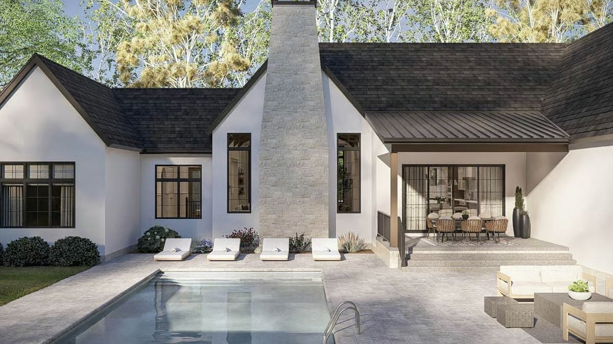 Outdoor Fireplace Chimney Anchors a Backyard Built for Actual Living