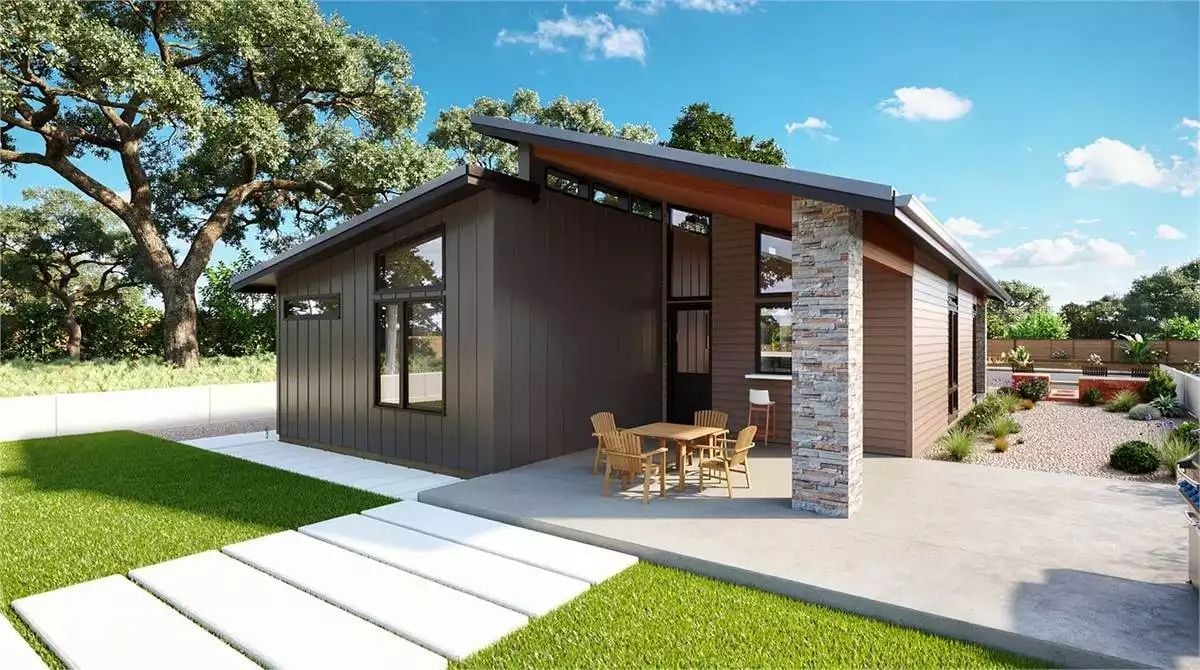 Dark Siding, Stone Column, and a Covered Patio That Actually Has Room to Breathe