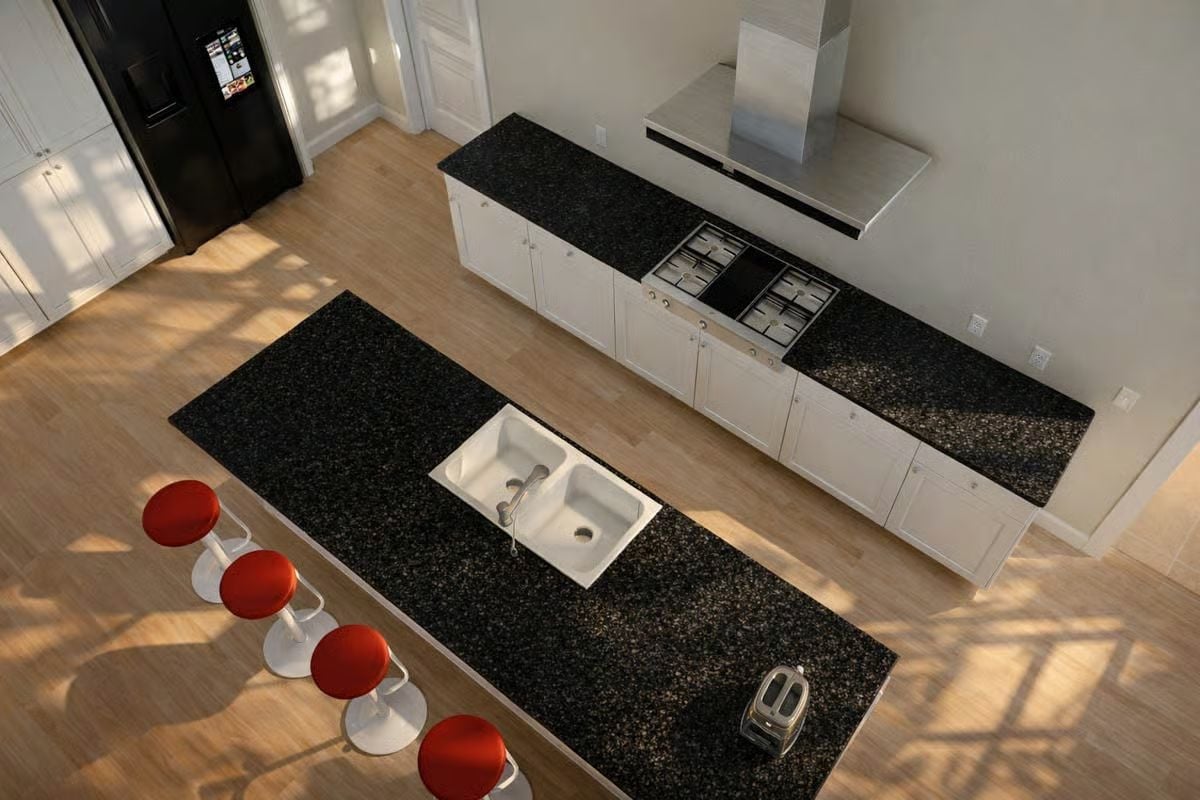 Black Granite, Red Stools, and a Kitchen Island That Does Real Work