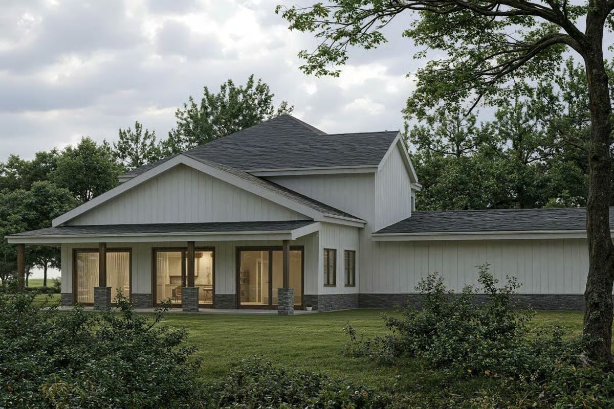 Board-and-Batten Exterior, Stone Base, and a Covered Rear Porch Built for Evening Use