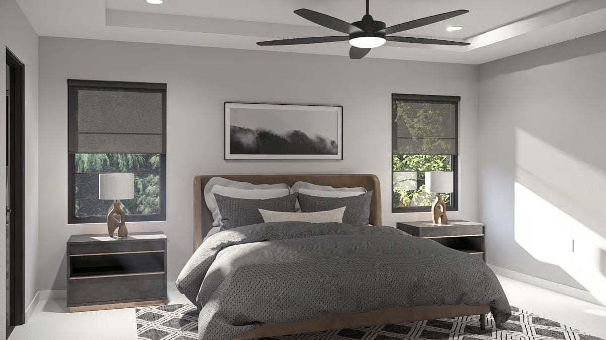 Bronze Headboard, Tray Ceiling, and Roman Shades That Don't Fight the View