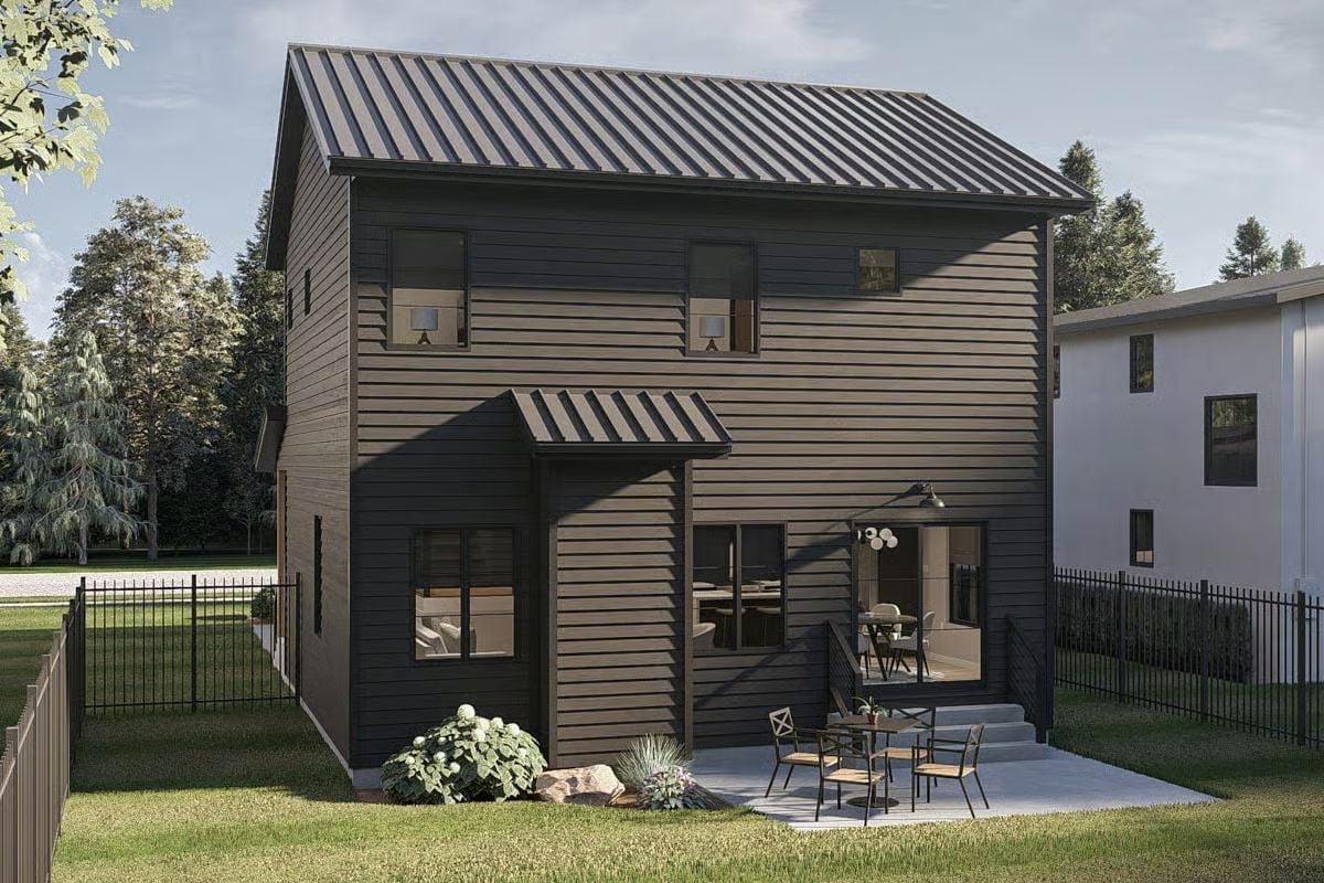 Dark Lap Siding and a Metal Awning Give This Backyard Elevation Real Presence