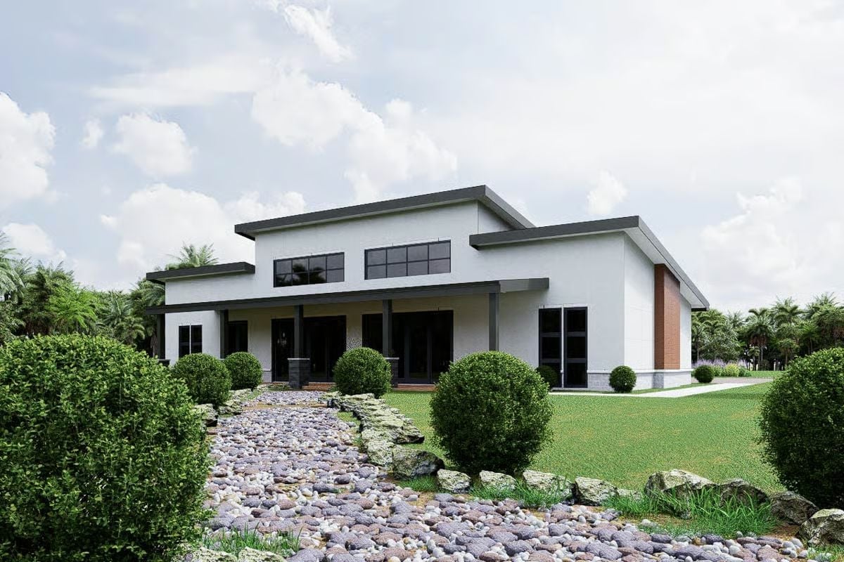 Stucco and Stone Front Where the Driveway Earns Its Keep