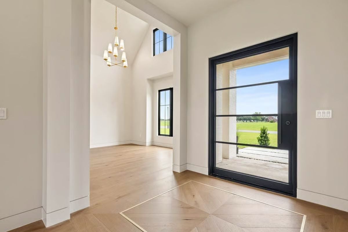 Pivot Door, Parquet Entry, and a View That Earns Its Keep