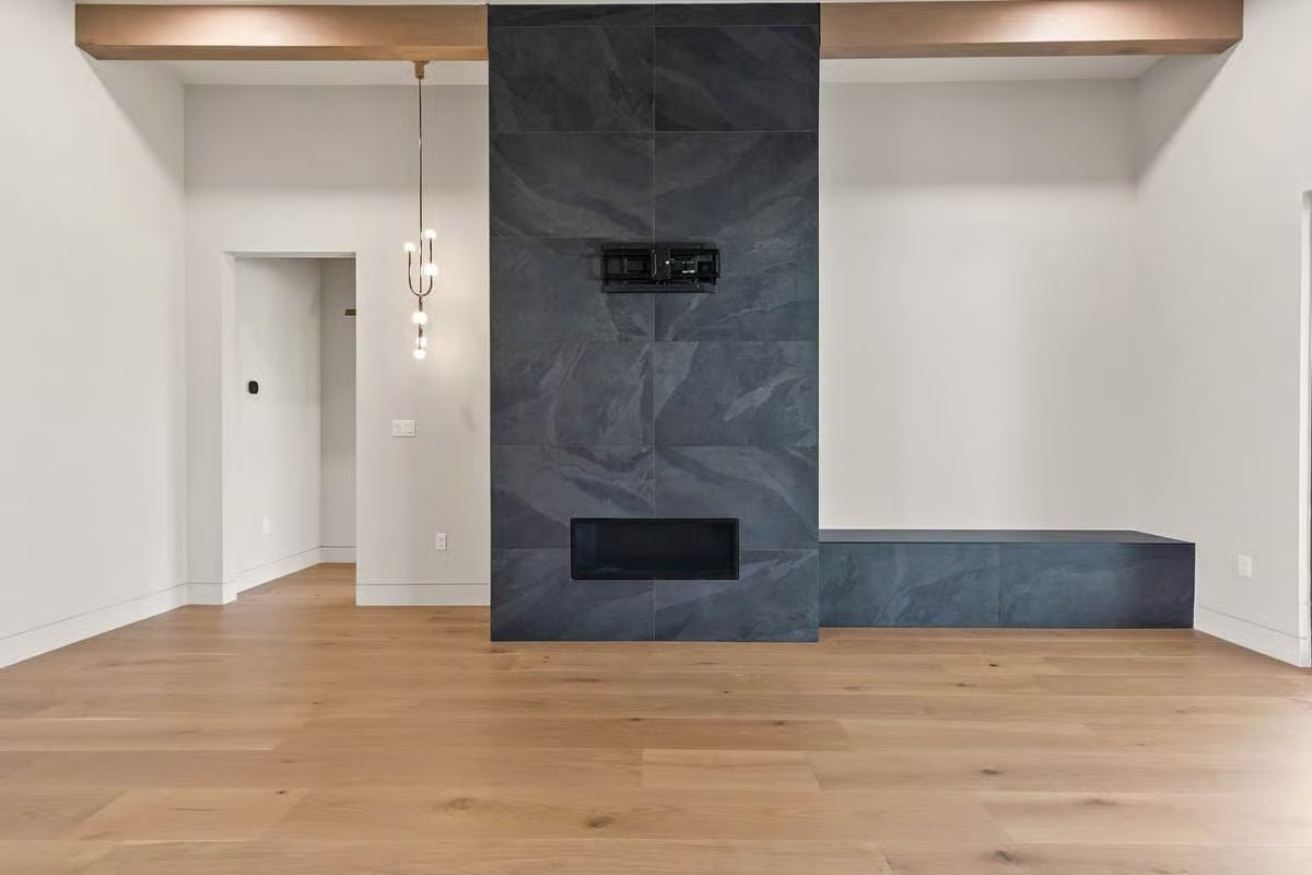 Slate Tile Tower, Linear Fireplace, and a TV Mount That's Ready for Its Close-Up