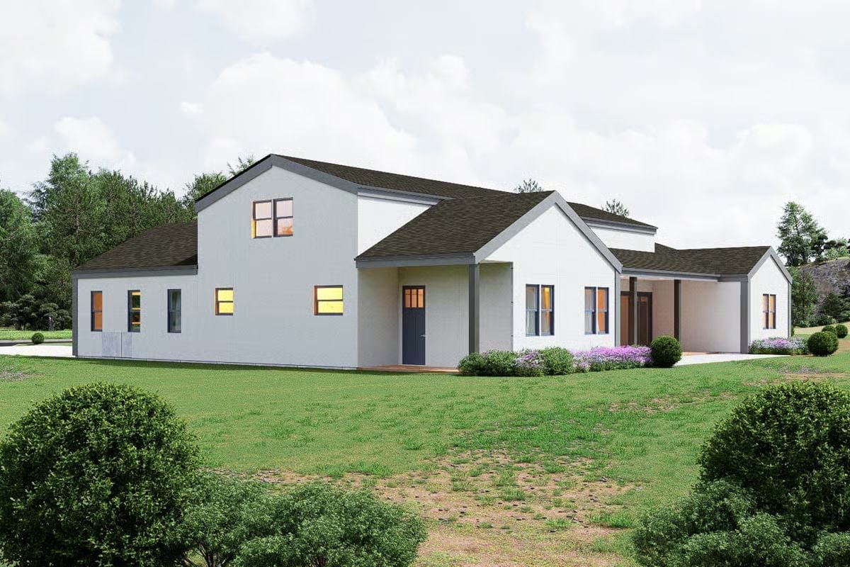 White Stucco and Dark Rooflines Give This Exterior a Lot of Personality