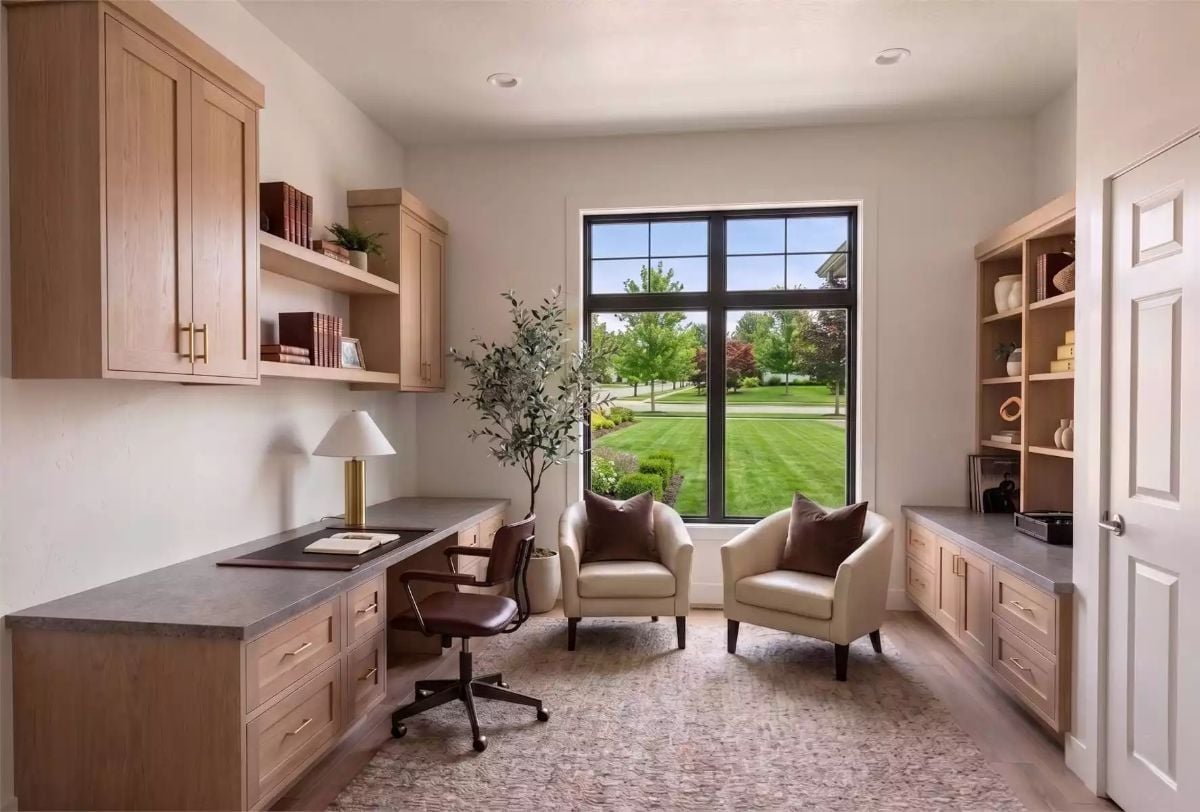 Built-In Cabinetry on Three Walls Gives a Home Office Somewhere to Put Everything