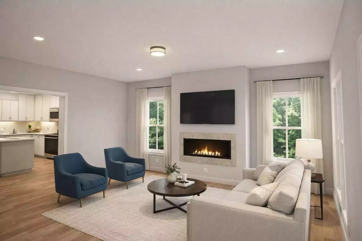Blue Chairs Against Gray Walls and a Fireplace That's Actually On