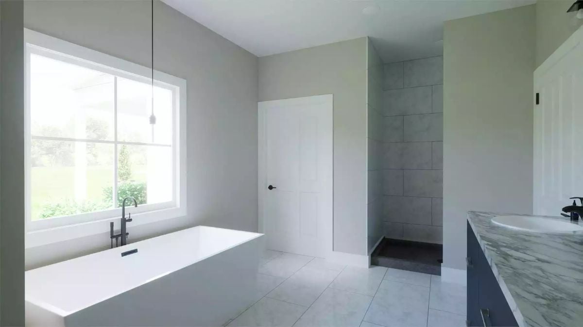 Freestanding Tub by the Window, Walk-In Shower Behind the Wall