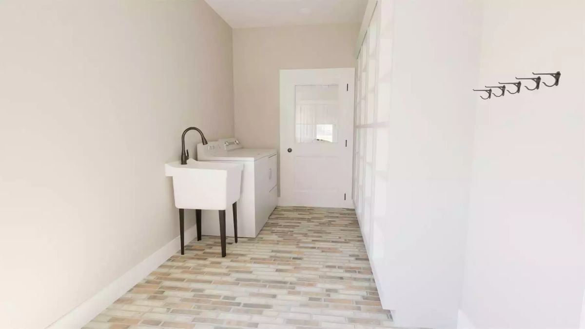 Utility Sink on Legs, Mosaic Floor Tile, and Coat Hooks That Actually Get Used