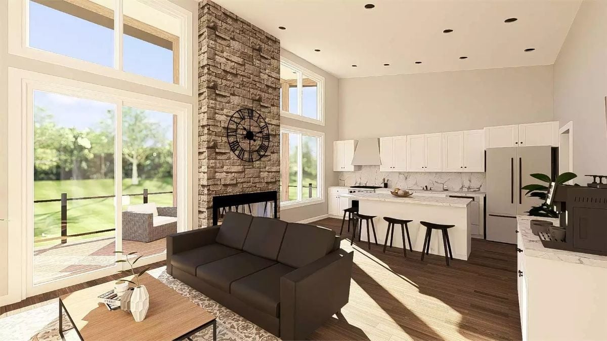 Floor-to-Ceiling Stone Fireplace Anchors an Open Living Space Built for Two
