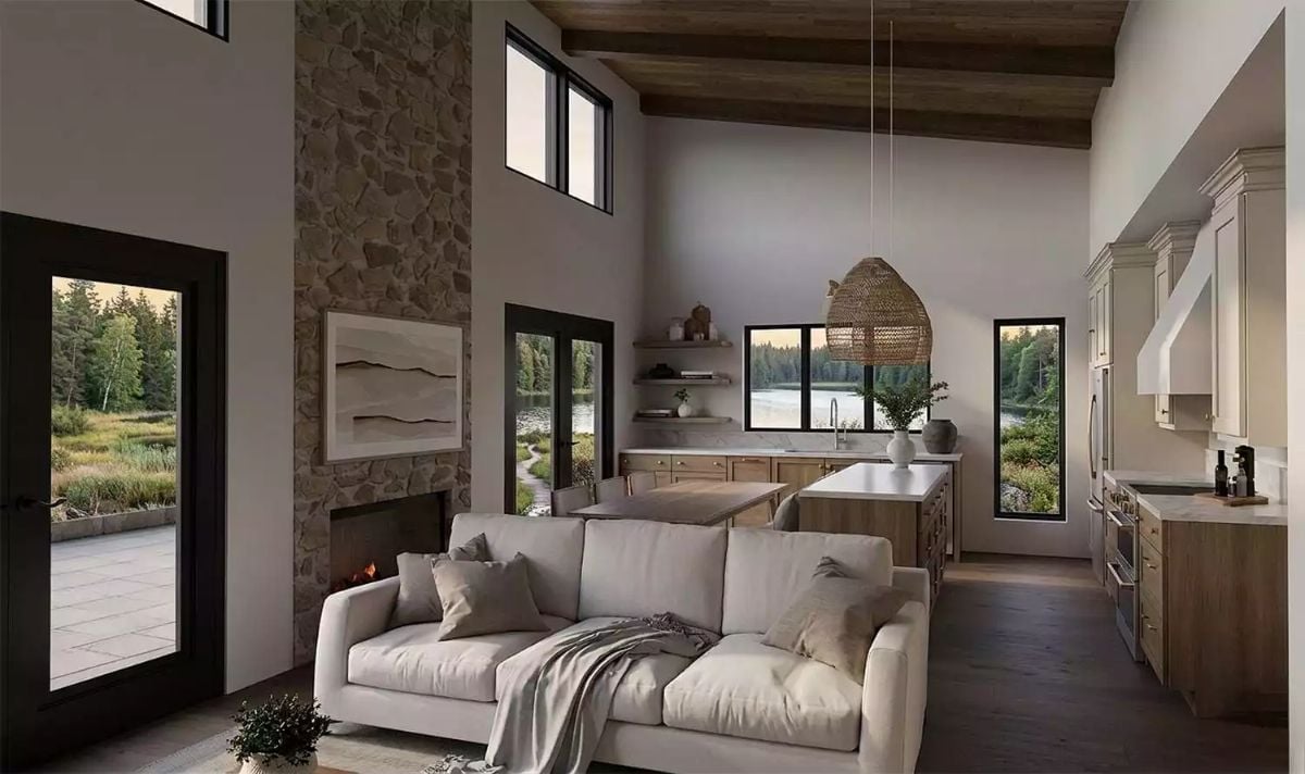 Stone Fireplace Tower and Exposed Beams Set the Tone for This Lake-View Interior