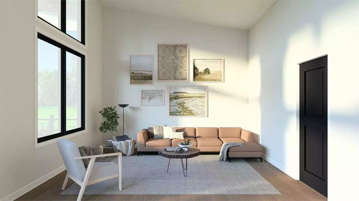 Gallery Wall Above a Sectional That Looks Like It Came From a Boutique Hotel