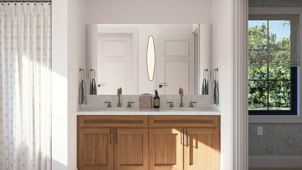 Brass Faucets and Warm Oak Vanity That Make Morning Routines Worth Waking Up For