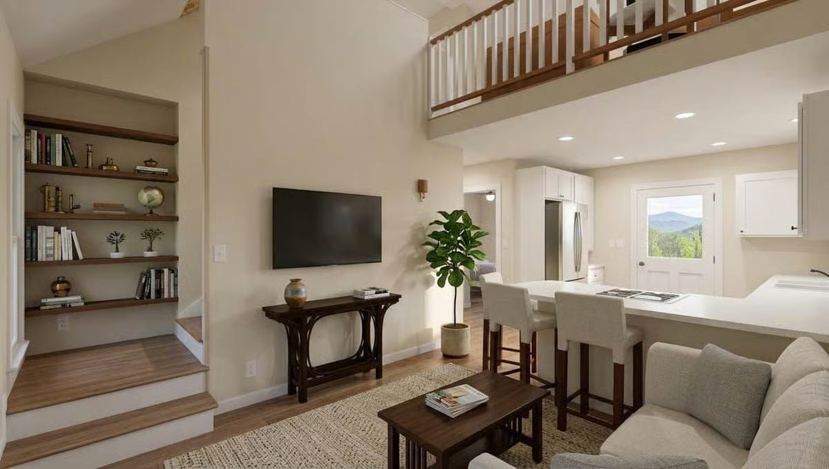 Double-Height Ceilings and a Loft Railing Give This Living Room Its Best Feature