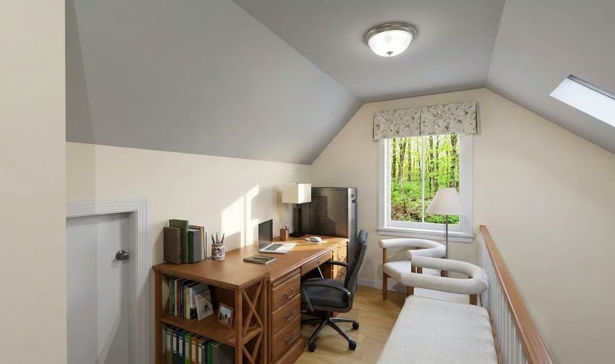 Loft Office with a Skylight and a View of the Trees Earns Its Keep