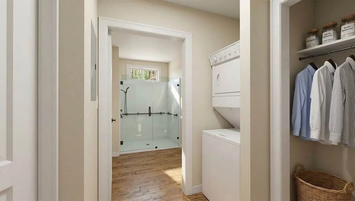 Stacked Washer-Dryer Next to a Hanging Rod Makes This Laundry Nook Genuinely Useful