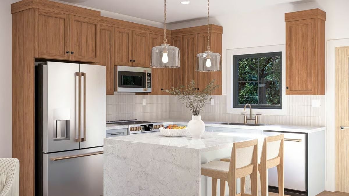 Warm Oak Cabinets and Marble Island That Earn Their Keep Every Day