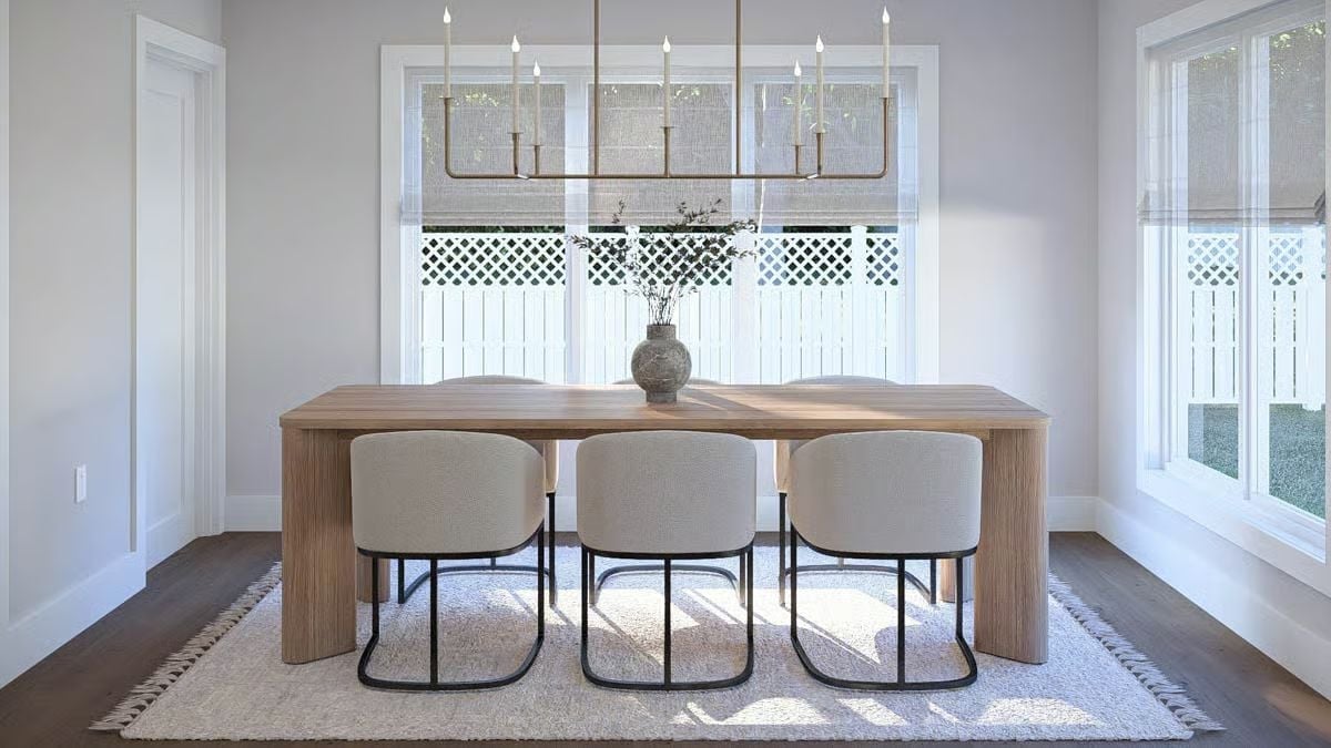 Brass Candlestick Chandelier Over a Table That Doesn't Need Anything Else
