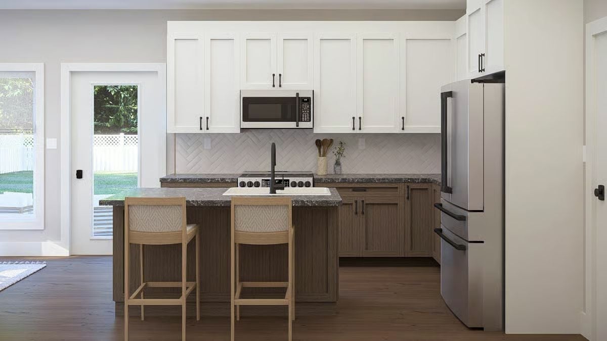 Dark Granite, Two Barstools, and Lower Cabinets That Actually Match the Island