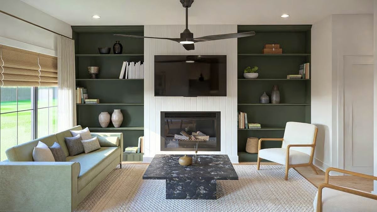 Dark Green Built-Ins Make the Fireplace Wall Do Double Duty