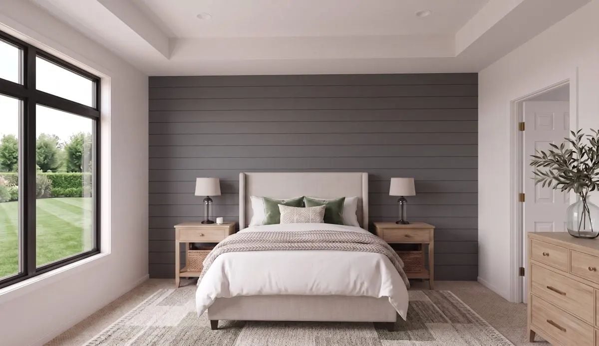 Dark Shiplap and Green Pillows Doing the Heavy Lifting in This Bedroom
