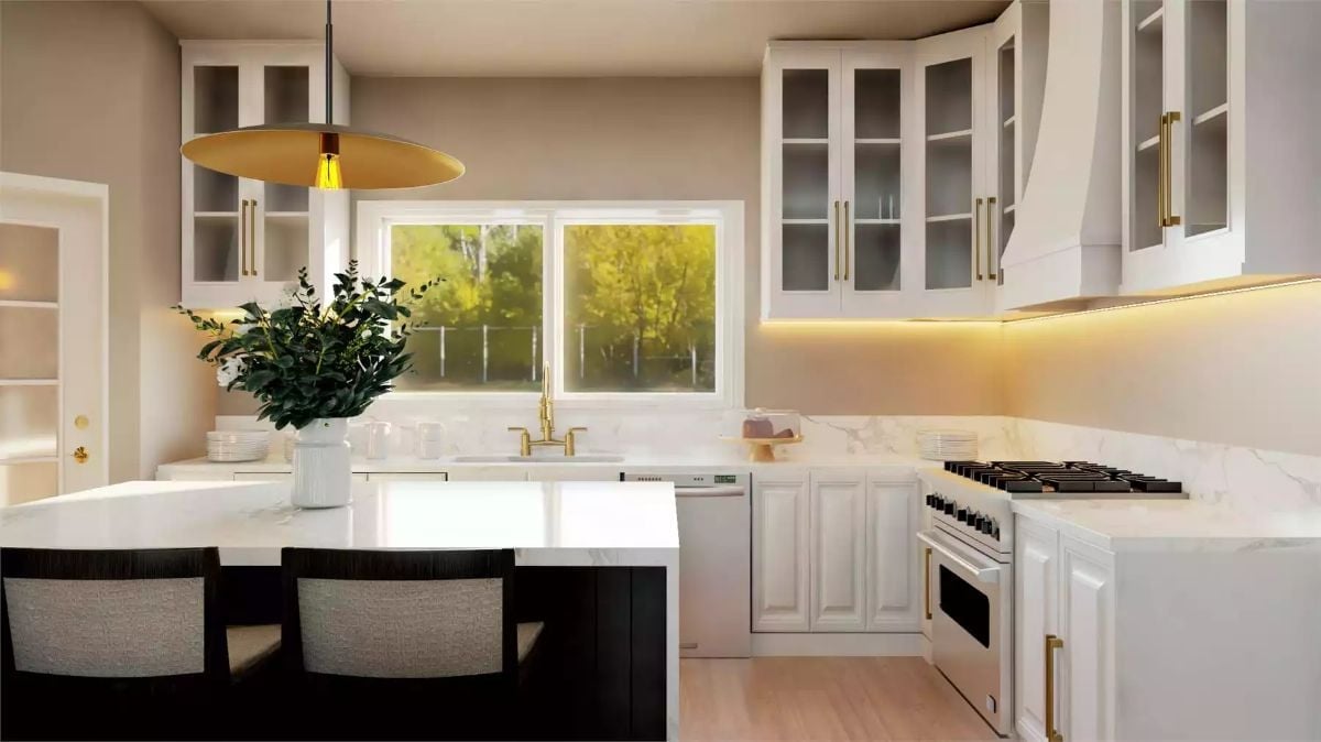 Gold Faucet, Marble Counters, and a Kitchen Island That Invites You to Stay