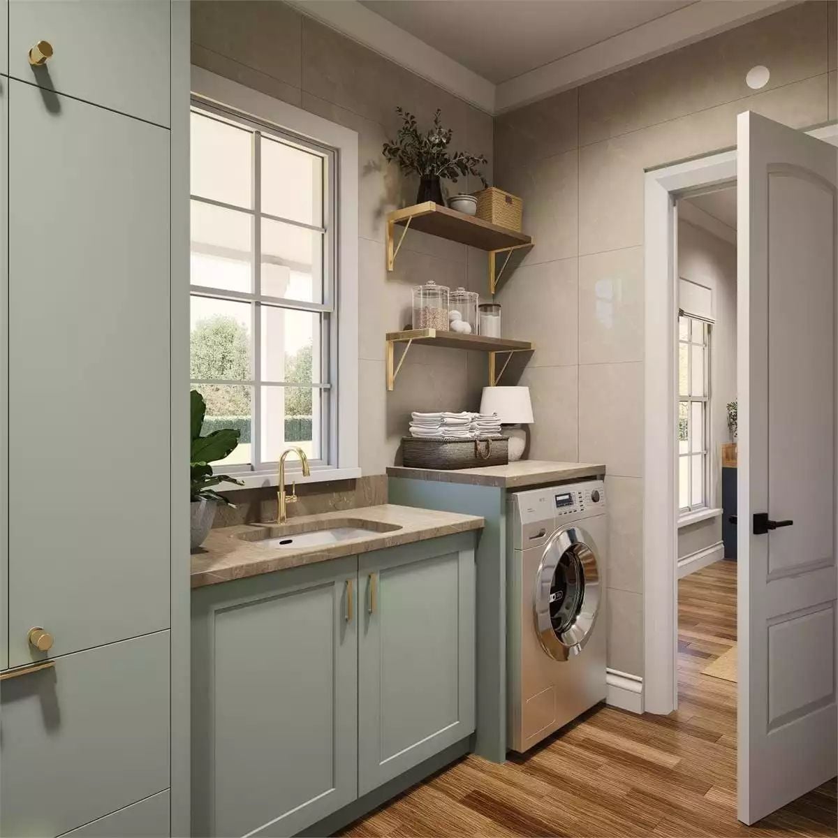 Sage Cabinets and a Gold Faucet Doing the Heavy Lifting in a Compact Laundry Room