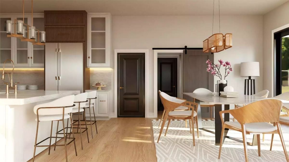 Rattan Pendant and Wood Chairs Bring Texture Into an Otherwise Quiet Dining Space