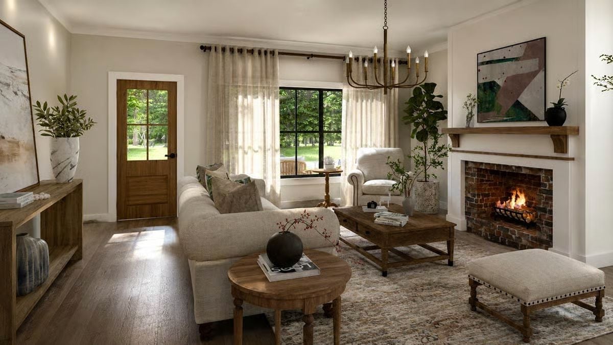 Brick Fireplace, Linen Sofas, and a Chandelier That Earns Its Place in the Room
