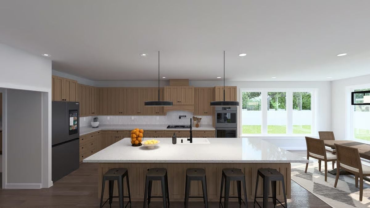 Warm Wood Cabinets, a Waterfall Island, and Seating for the Whole Crew