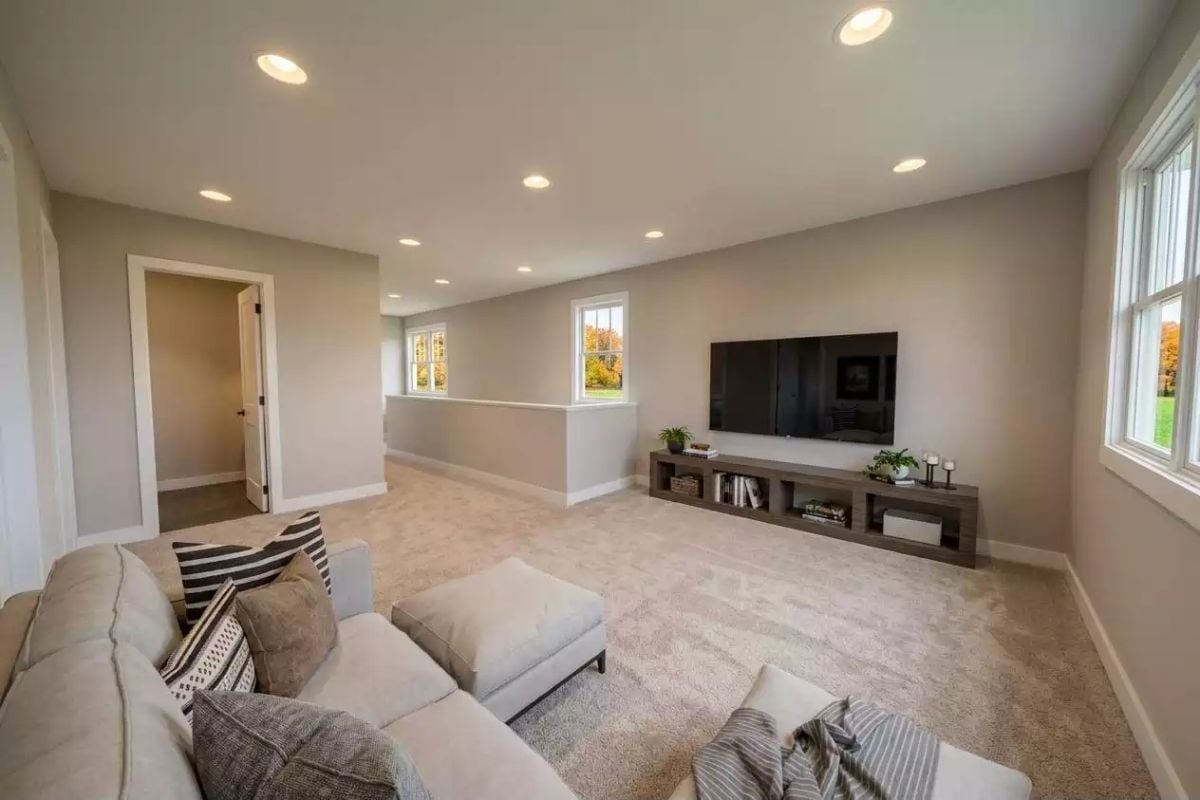 Low-Profile TV Console With Open Shelving Keeps the Loft From Feeling Like an Afterthought