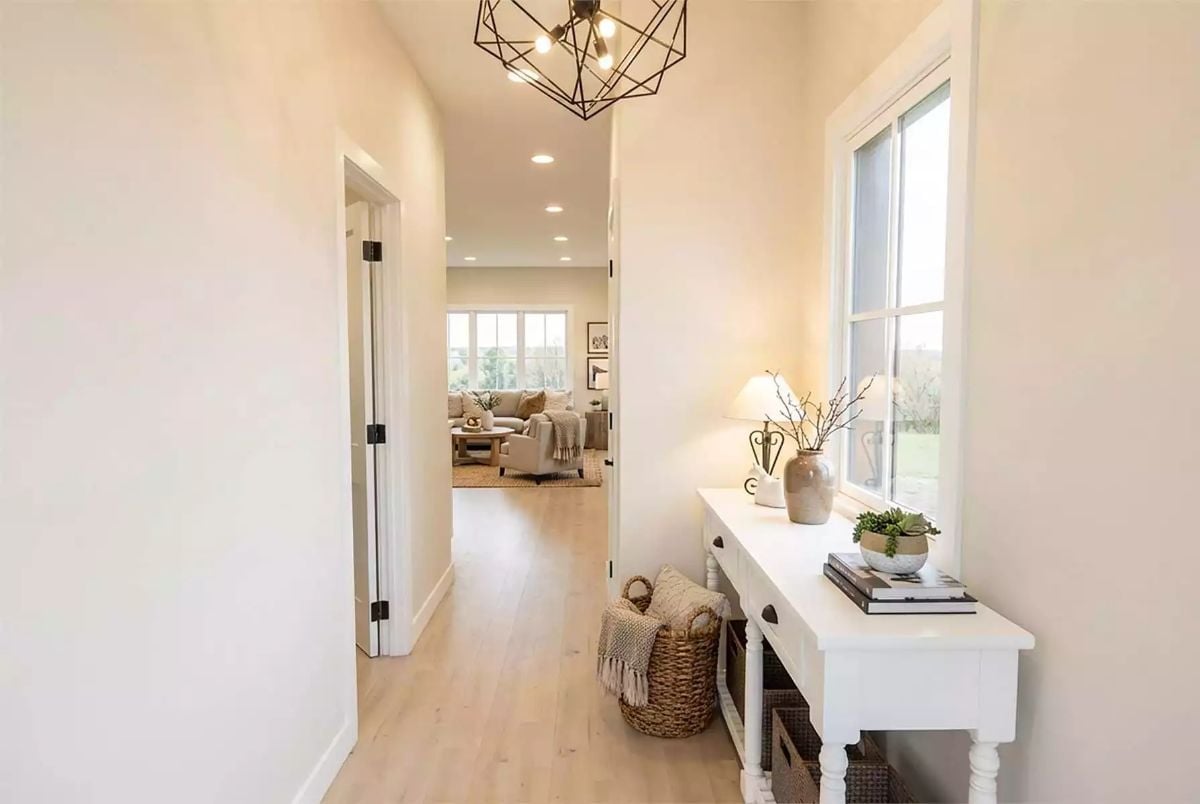 Geometric Chandelier, White Console, and a Hallway That Actually Welcomes You