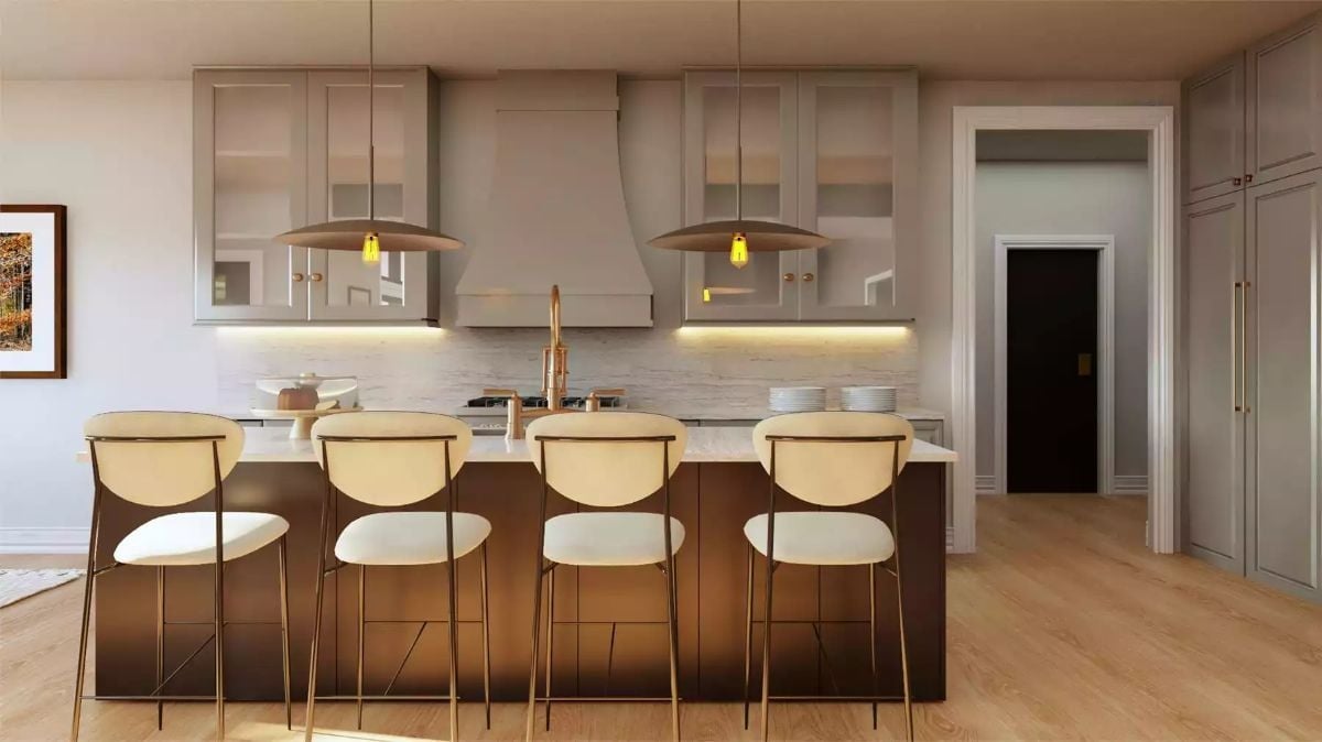 Copper-Toned Island Base and Cream Barstools Make a Strong Case for Each Other