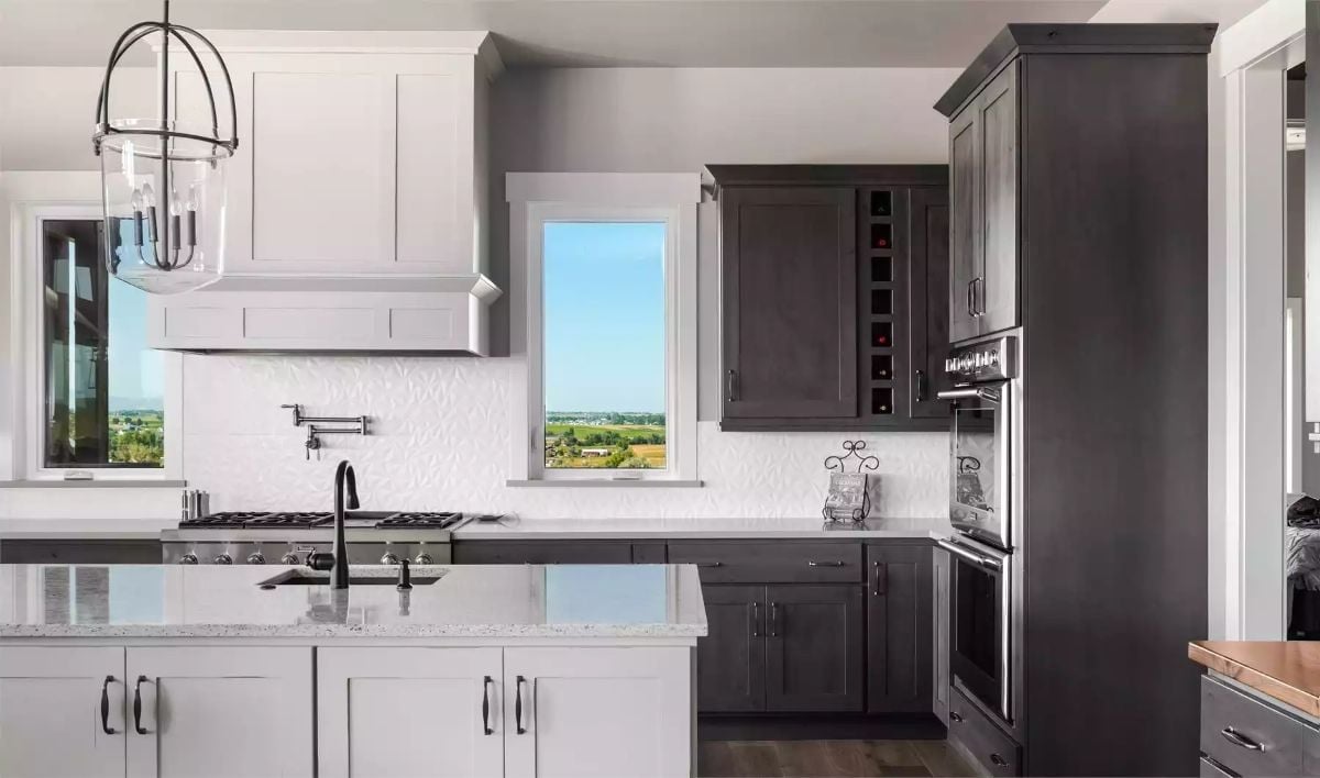 Dark Cabinetry, Wine Rack Built In, and That View Out Back