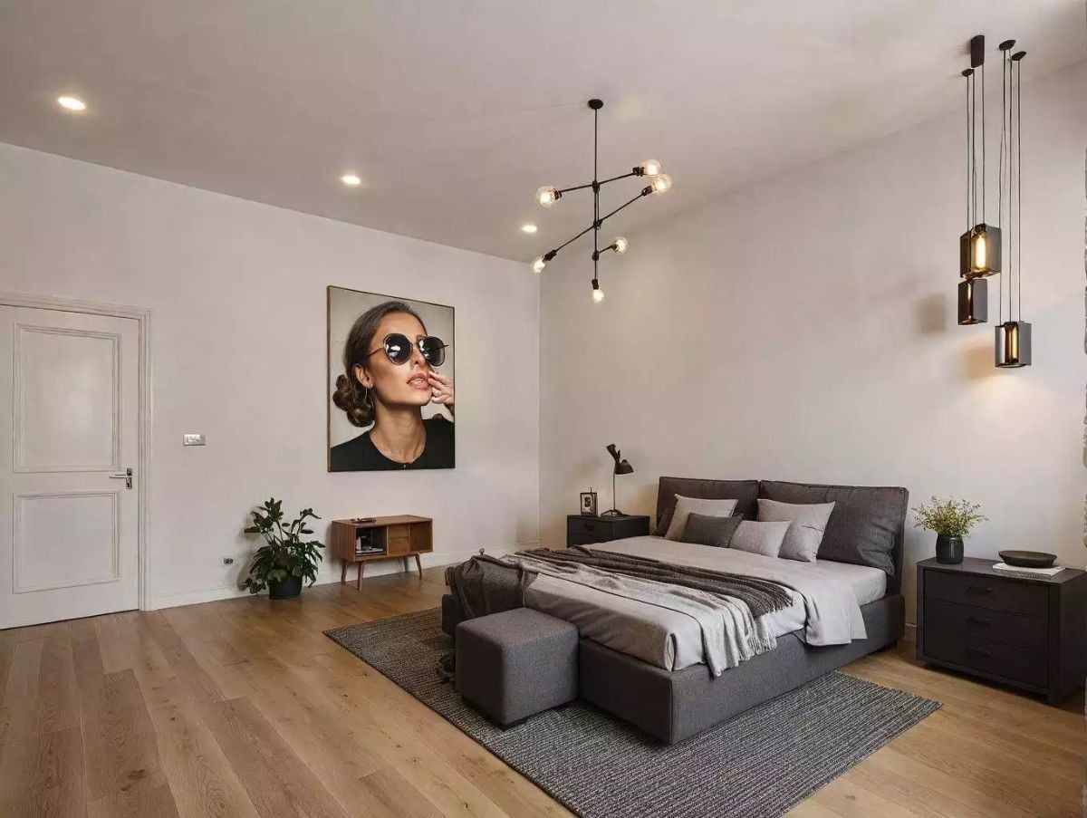 Pendant Clusters and a Portrait Wall Turn This Bedroom Into Its Own Edit