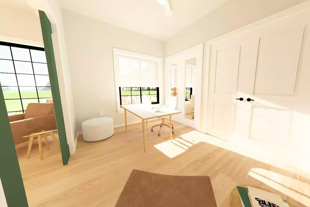 Gold Desk Legs and a White Roller Shade Doing Exactly What They Should