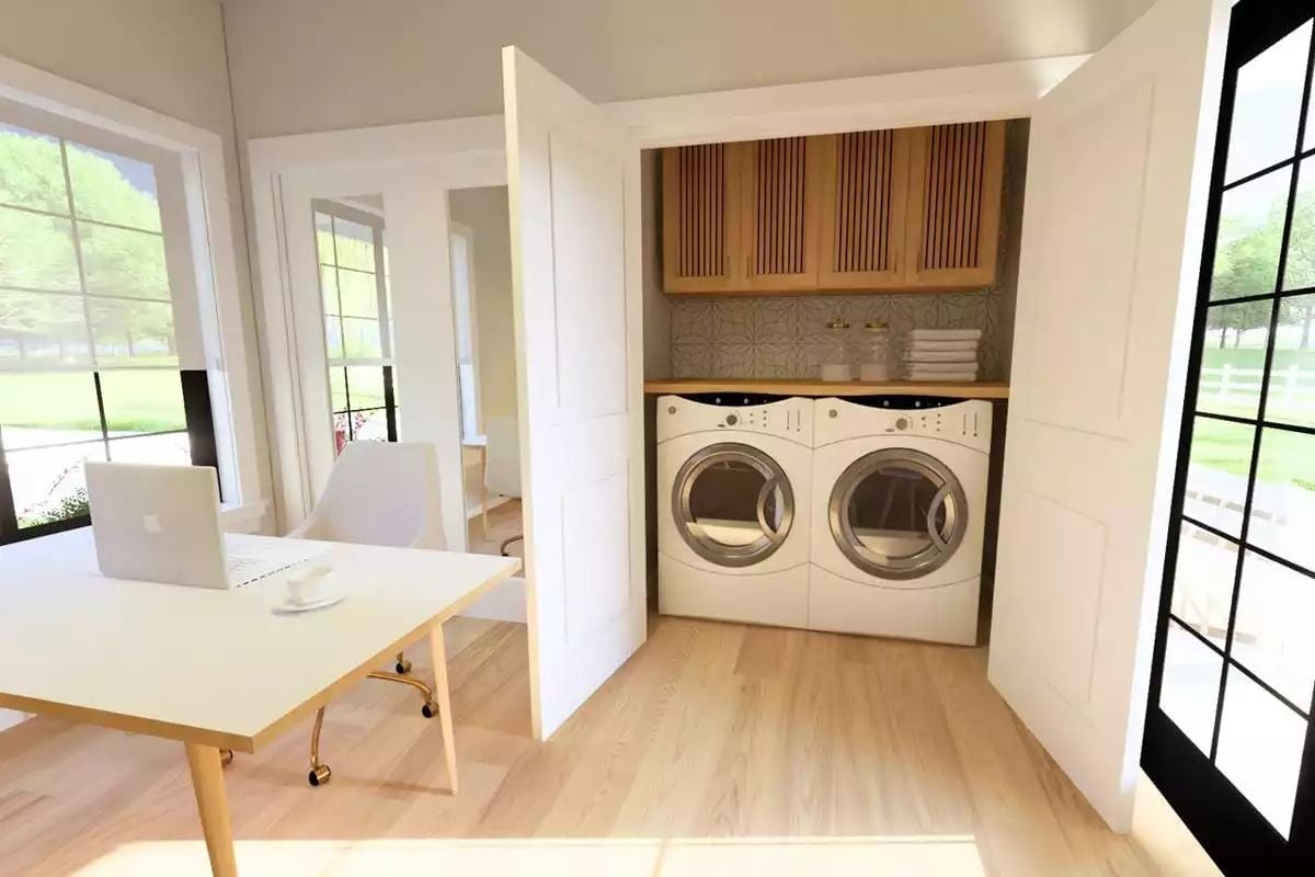 Laundry Closet Hidden Behind Cabinet Doors That Do the Heavy Lifting