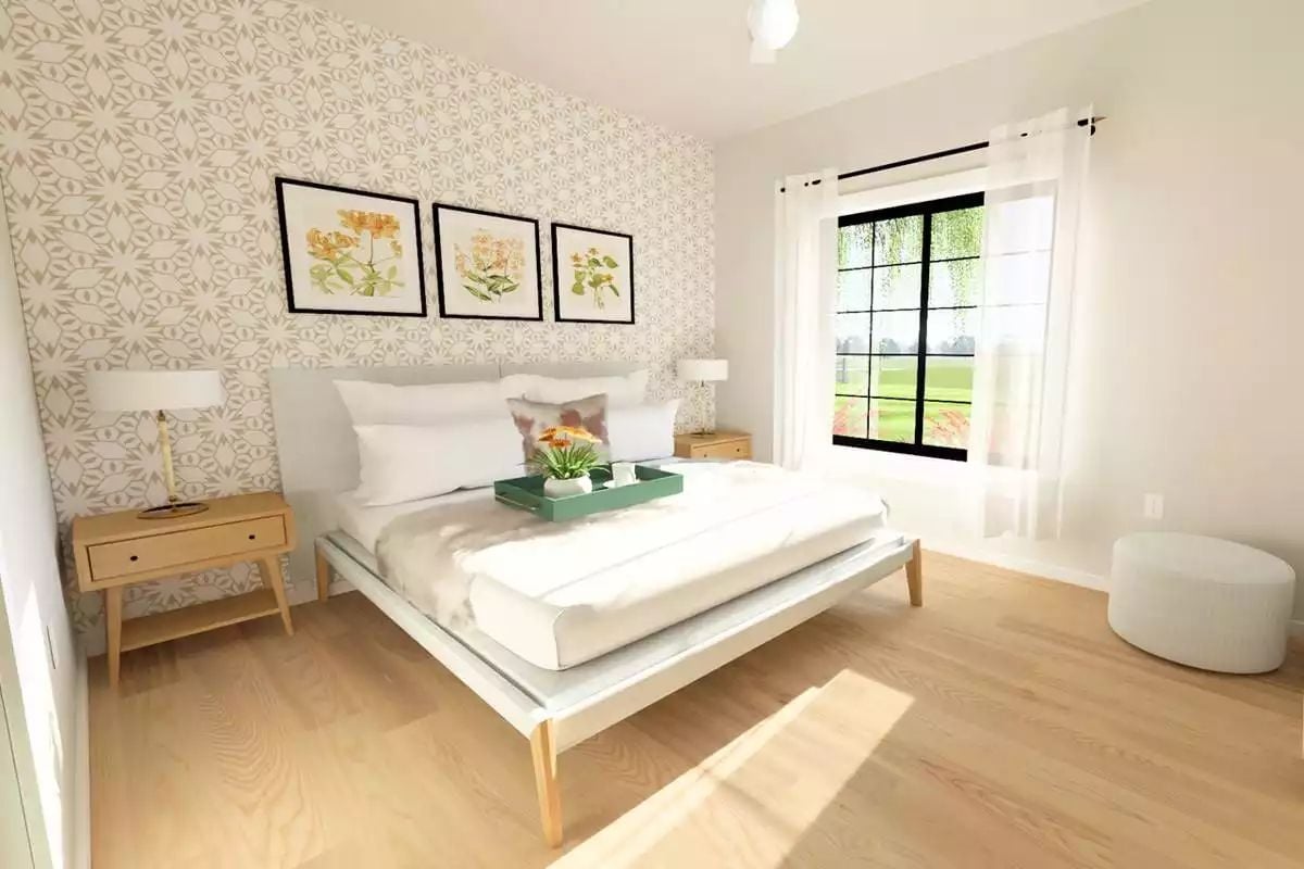 Botanical Prints and a Patterned Accent Wall Set a Soft, Unhurried Tone